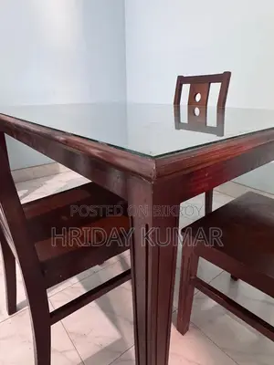 Stylish 6-Seater Dining Table and 4 Chairs for Sale (Almost New)