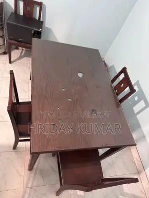 Stylish 6-Seater Dining Table and 4 Chairs for Sale (Almost New)