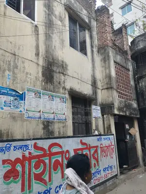 Two-story house with shops for sale in Khilgaon, offering an income opportunity of over 1 lakh