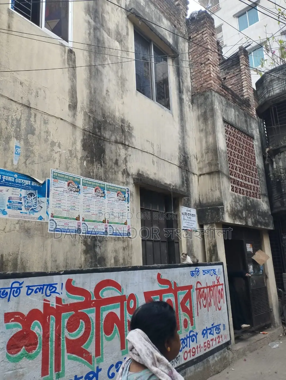 Two-story house with shops for sale in Khilgaon, offering an income opportunity of over 1 lakh
