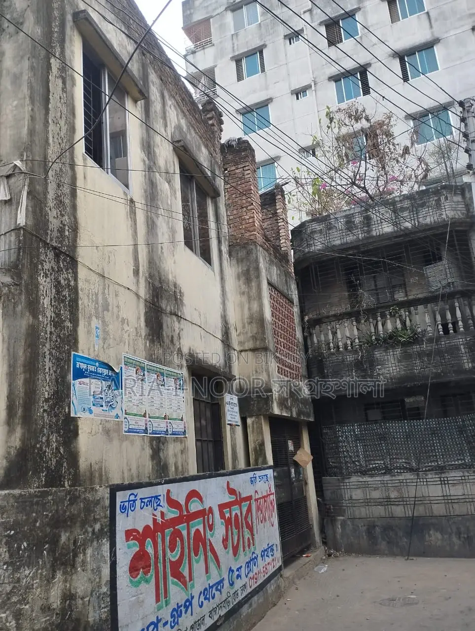Two-story house with shops for sale in Khilgaon, offering an income opportunity of over 1 lakh