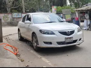 Mazda Axela . 2004
