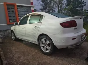 Mazda Axela . 2004