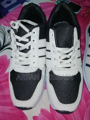 Stylish Black & White Sneakers – Almost New Urgent Sell