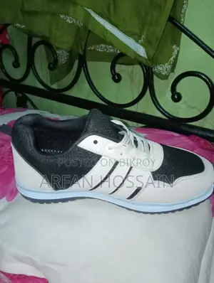 Stylish Black & White Sneakers – Almost New Urgent Sell