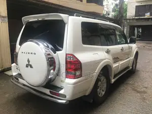 মিতসুবিশি পাজেরো স্পোর্ট ২০০৪ পার্ল