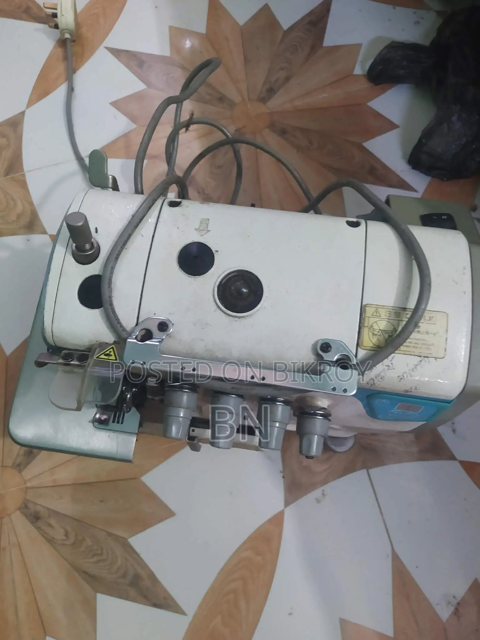 Overlock sewing machine.