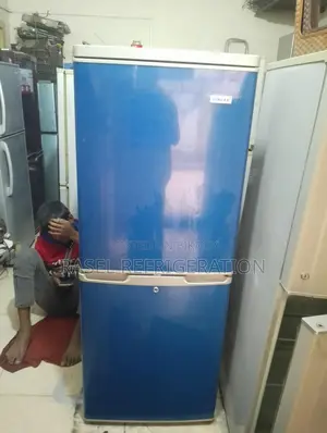 14 cubic feet refrigerator for sale, running and all original.