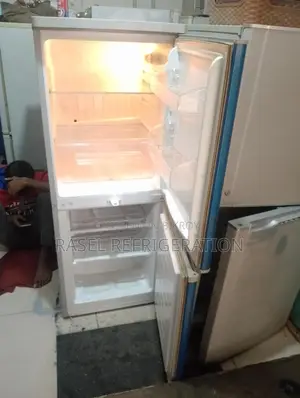 14 cubic feet refrigerator for sale, running and all original.