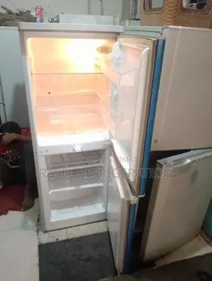 14 cubic feet refrigerator for sale, running and all original.