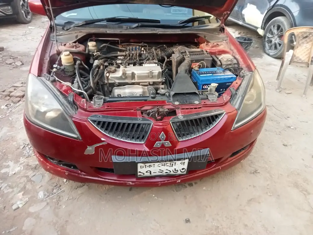 Mitsubishi Lancer . 2004