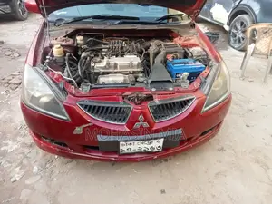Mitsubishi Lancer . 2004