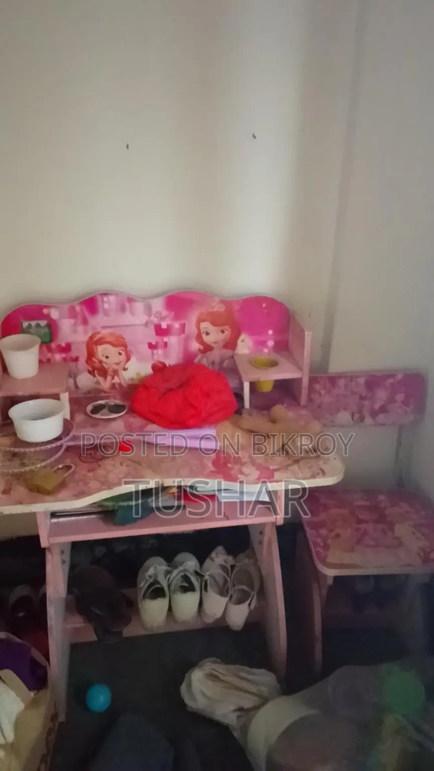 A Trolley, Small Sofa, and Study Table