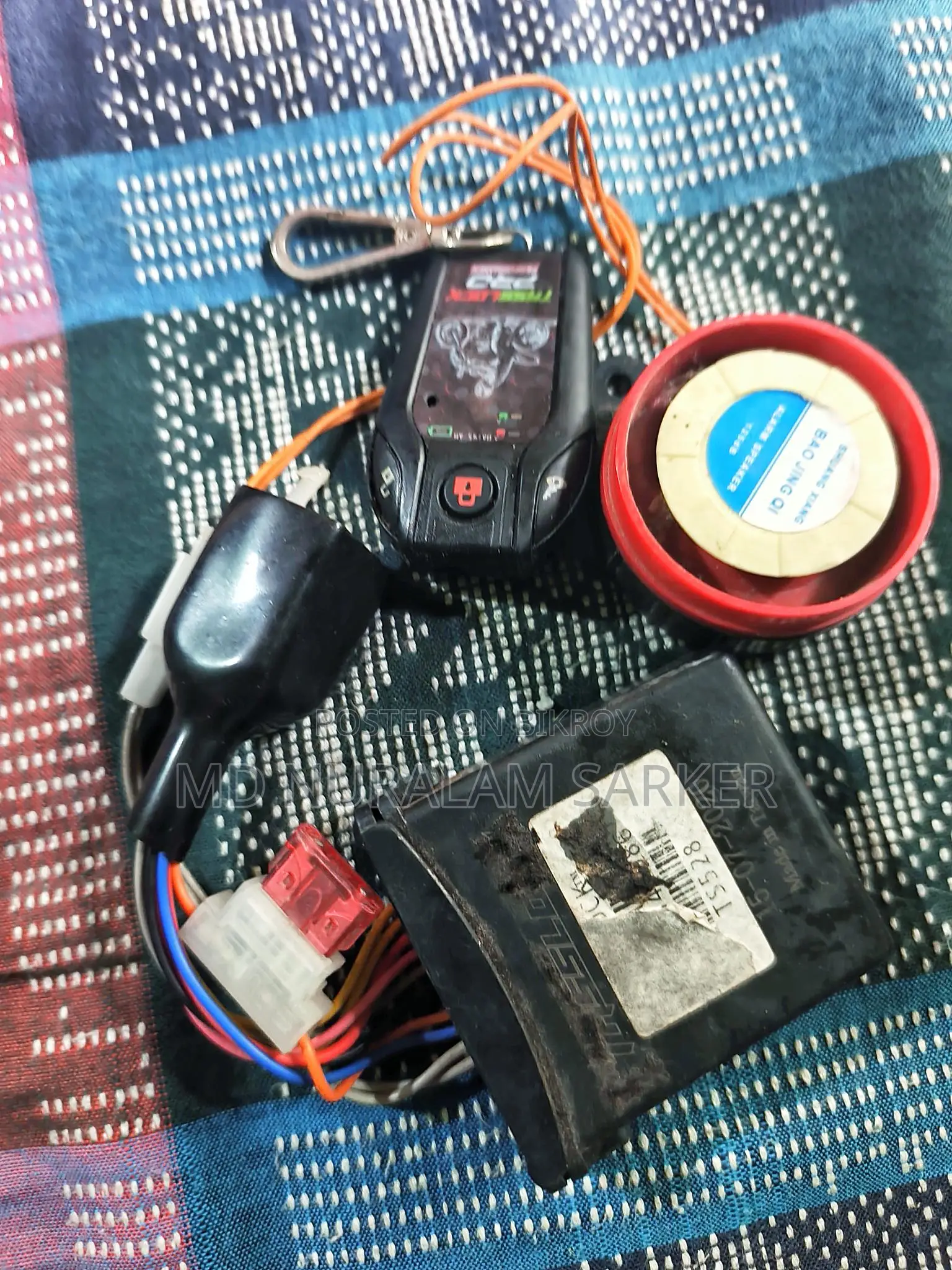 Tasslock motorcycle security alarm system