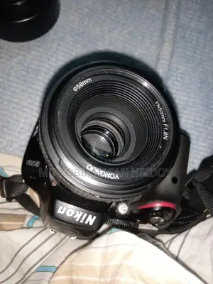 Nikon D5100 with 2x 50mm Prime Lenses