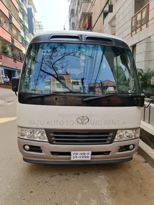 Nissan Coster Bus For Rent