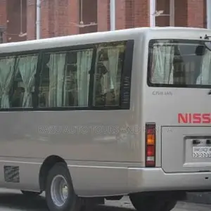 Nissan Coster Bus For Rent