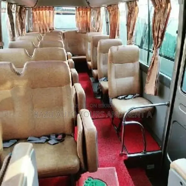 Nissan Coster Bus For Rent
