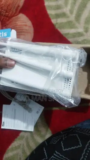 রাউটার Netis ৩/৪ দিন ব্যবহৃত, তারসহ ৪০ গজ