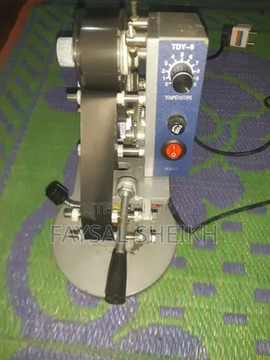 ডেট বসানো ইলেকট্রনিক্স মেশিন