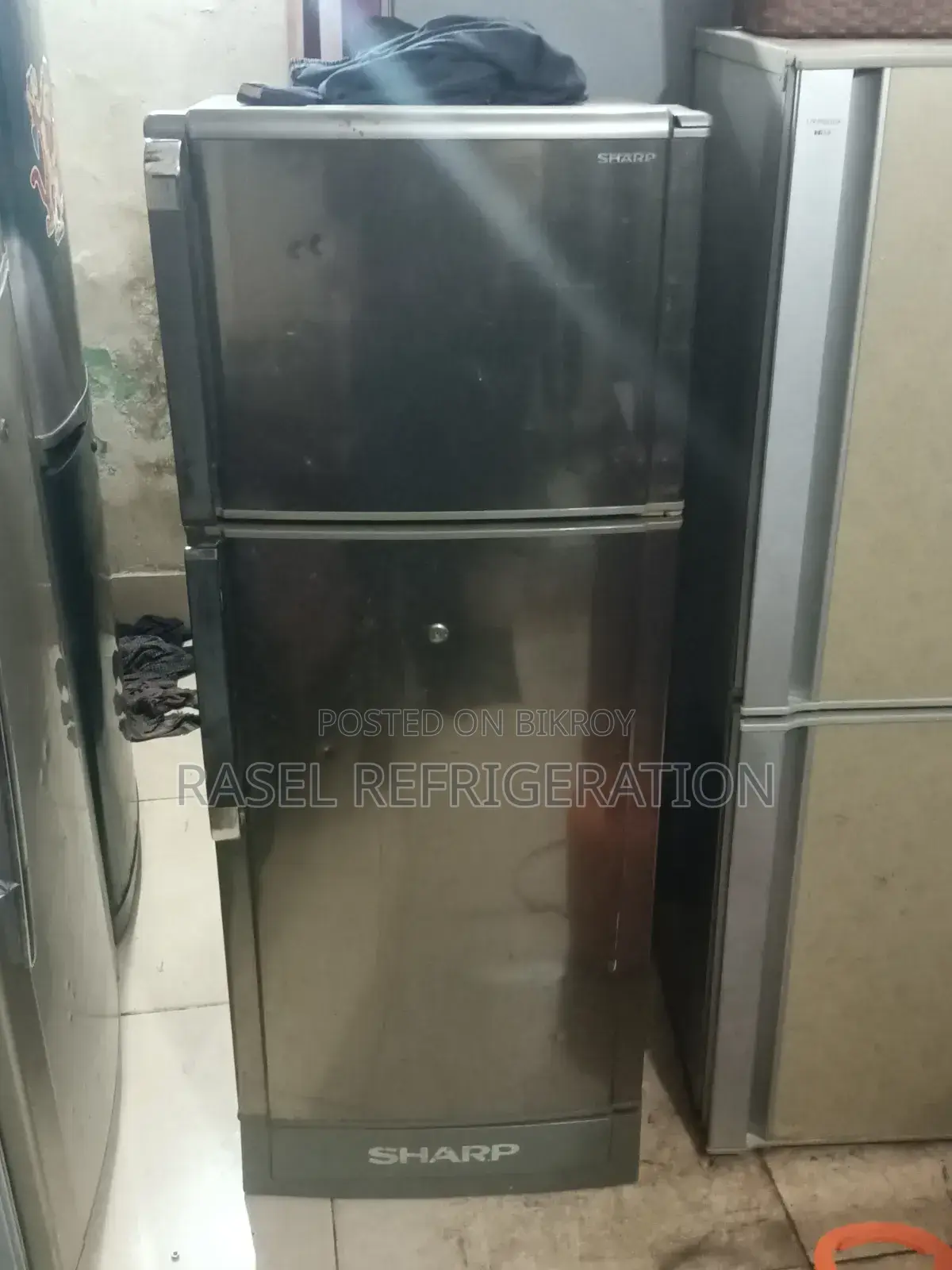 Sharp company 12 Cubic Feet refrigerator for sale.