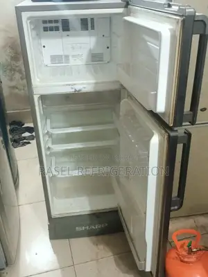 Sharp company 12 Cubic Feet refrigerator for sale.