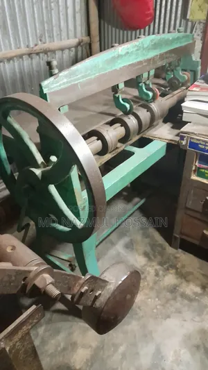 কাটিং ও রোলার মেশিন