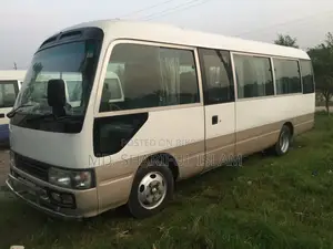টয়োটা কোস্টার ২০০৪ সাদা