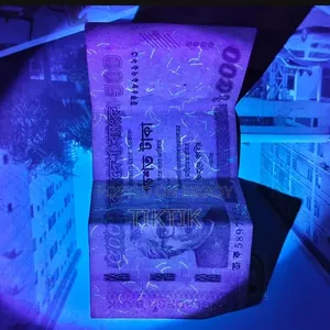 Detect Counterfeit Money in One Click