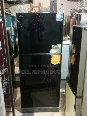 337 Liter running Walton company fridge for sale.