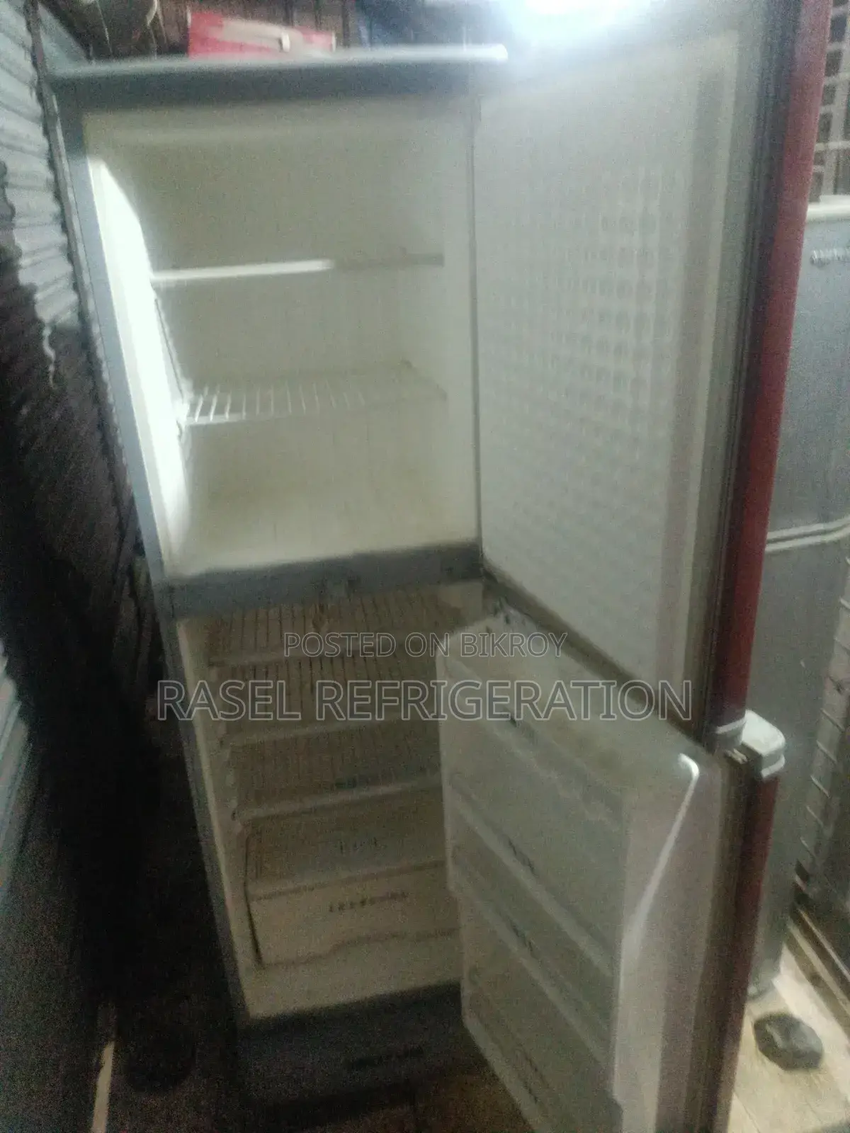 244 Liter Walton fridge for sale.