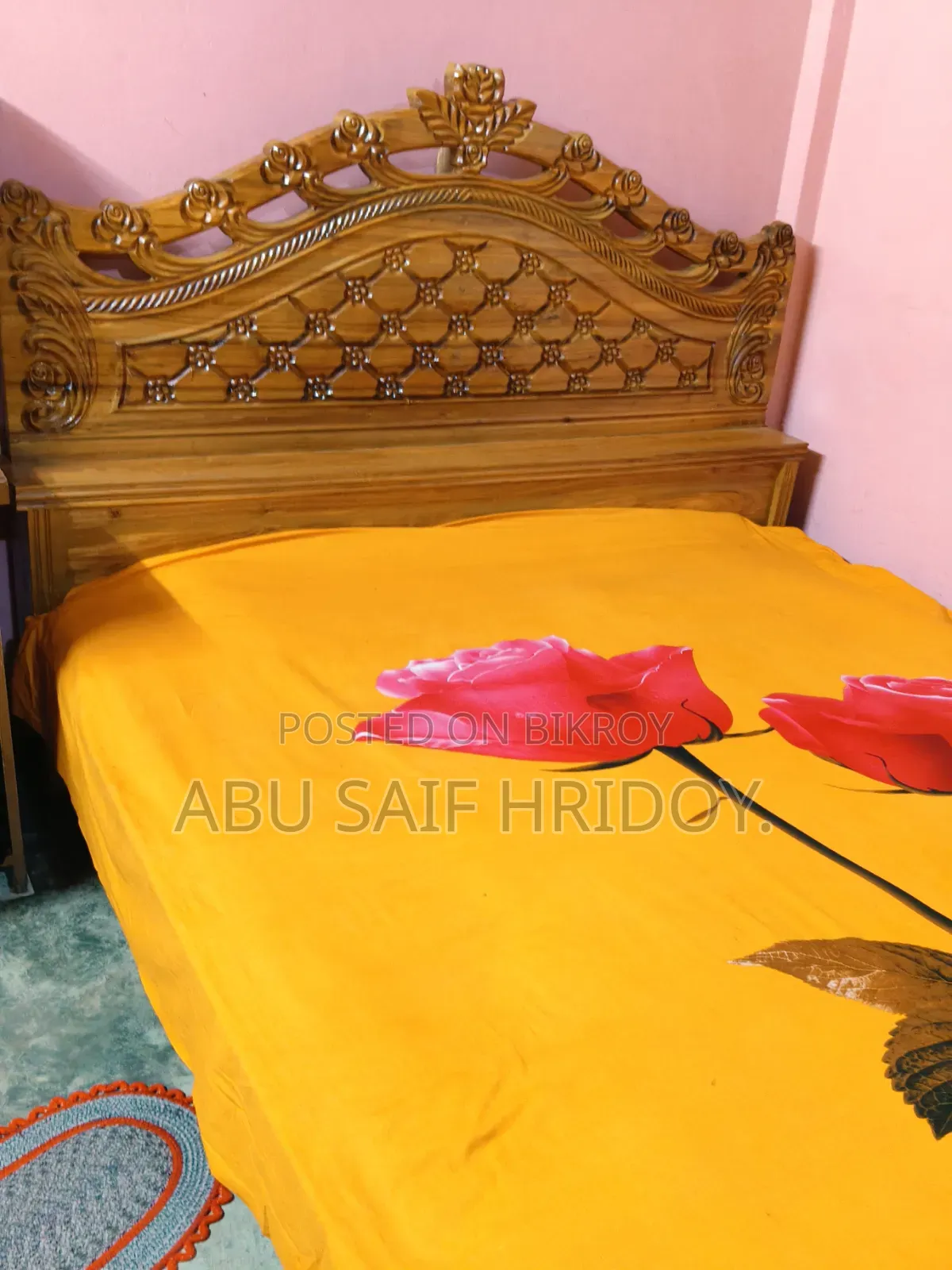 Akash Moni wood bed for sale.
