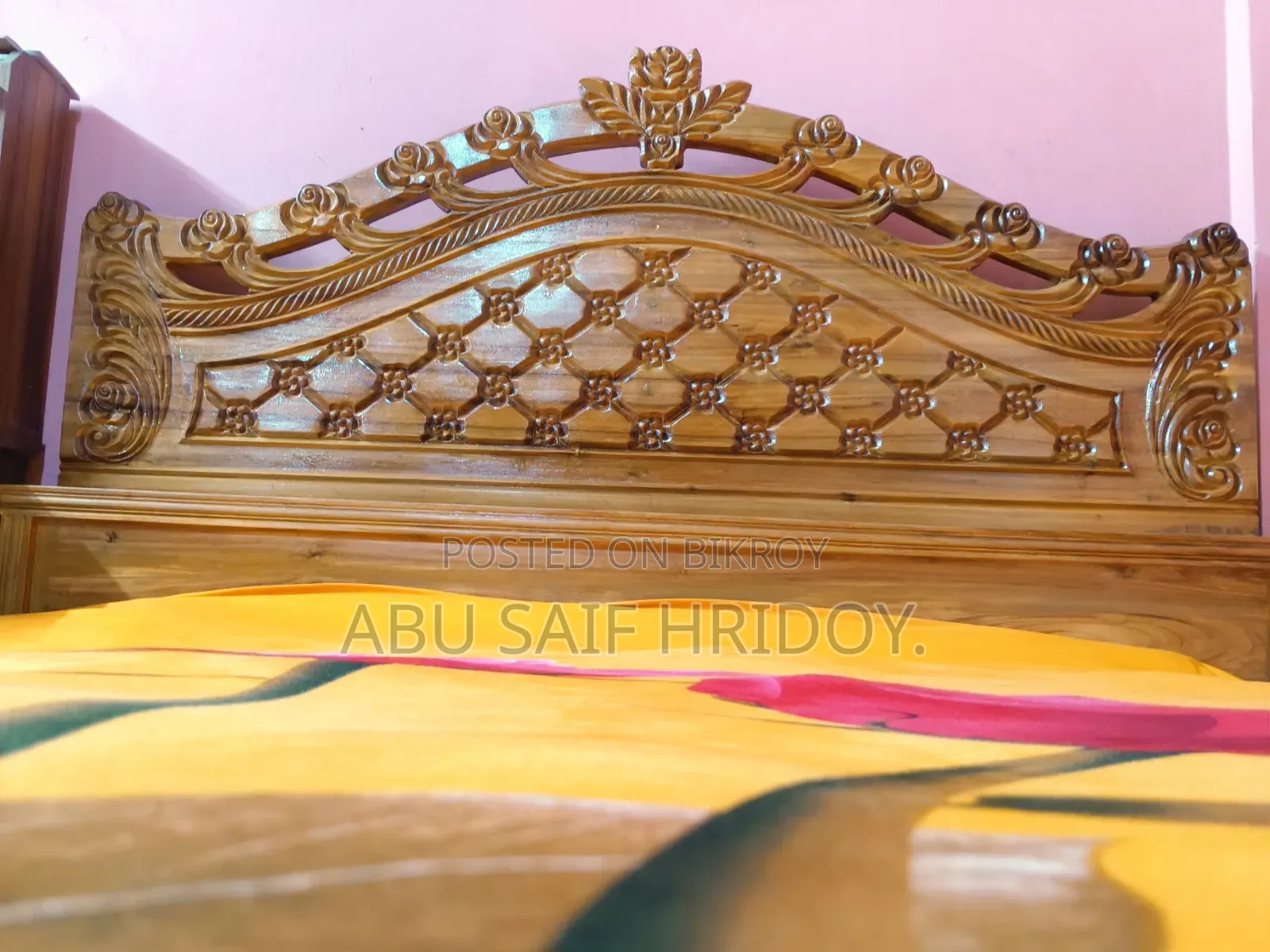 Akash Moni wood bed for sale.