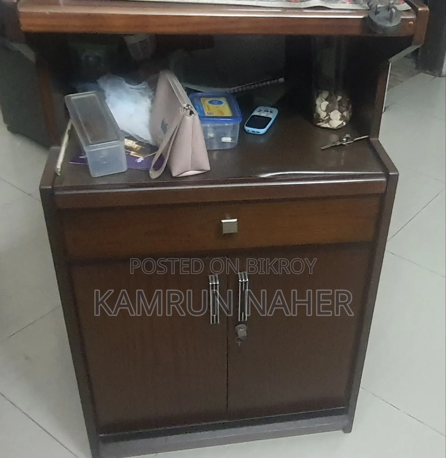 Rack Made by Navana. Used. Things Inside Not for Sale.