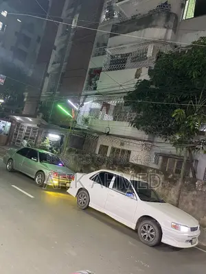 টয়োটা করোলা ১৯৯৬ সাদা