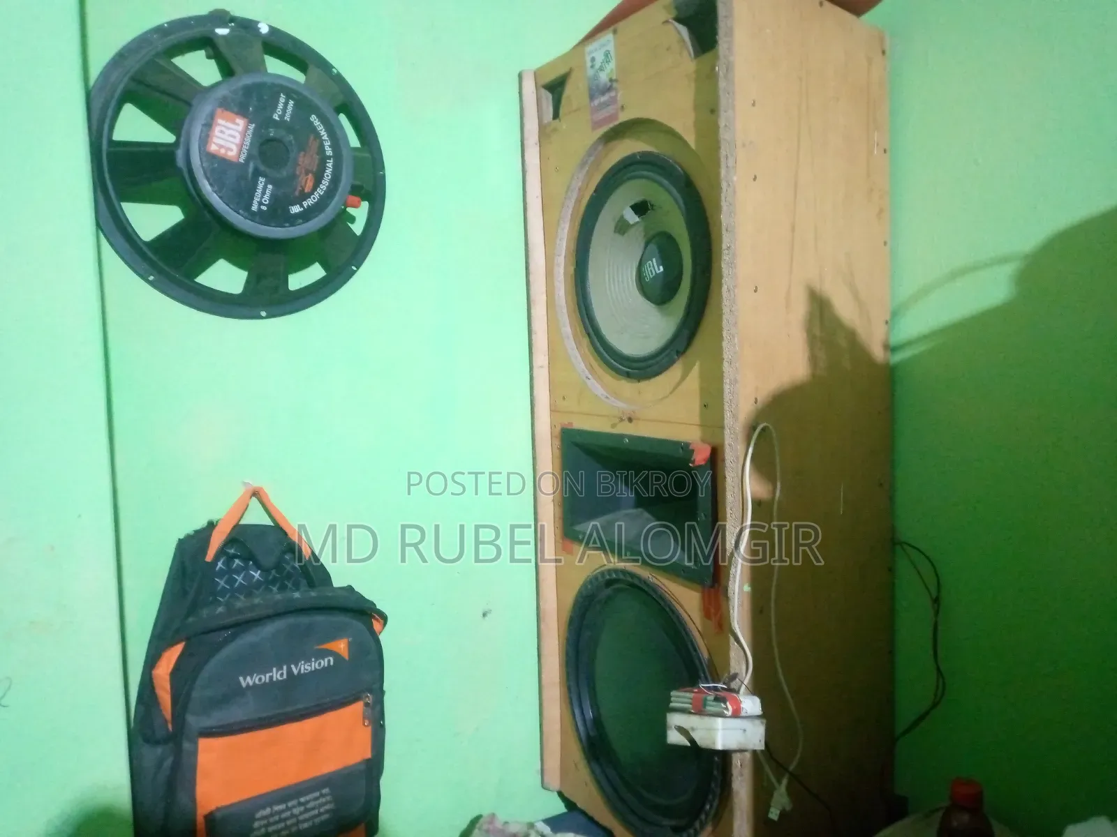 Two speakers, one 16-inch and one 12-inch