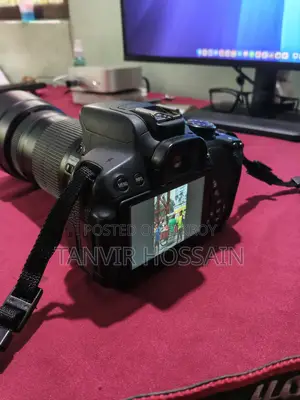 Canon EOS 700D + 55-250mm Lens + 64GB SD Card + 2 Batteries + Bag