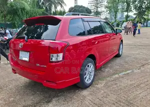 Toyota Corolla Fielder 1.5 Petrol Front Wheel Drive 2012 Red