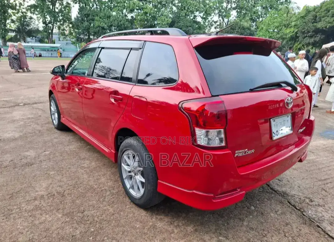 Toyota Corolla Fielder 1.5 Petrol Front Wheel Drive 2012 Red