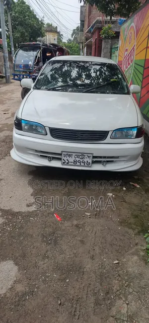 নতুন টয়োটা করোলা হাইব্রিড এলই ২০২৫ সাদা