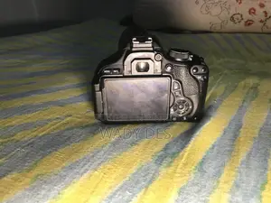 Canon 600d + Canon 75-300mm Zoom Lens.