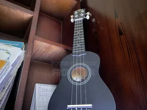 1 Month Used Ukelele + Bag