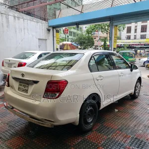 টয়োটা এক্সিও ২০১৩ সাদা