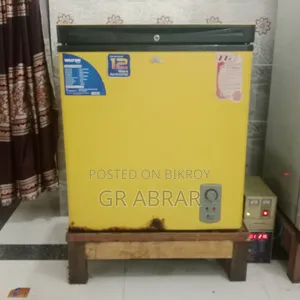 A small Walton brand deep freezer for sale.