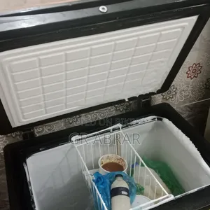 A small Walton brand deep freezer for sale.