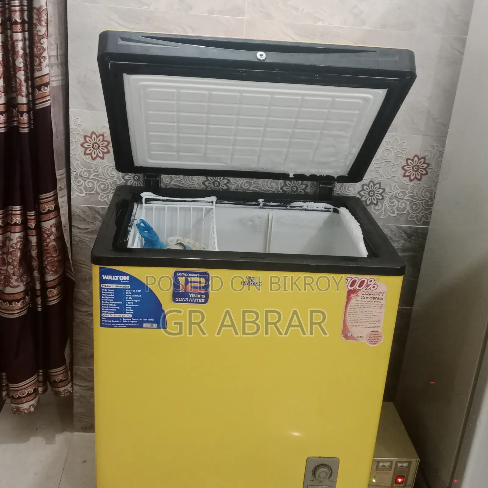 A small Walton brand deep freezer for sale.