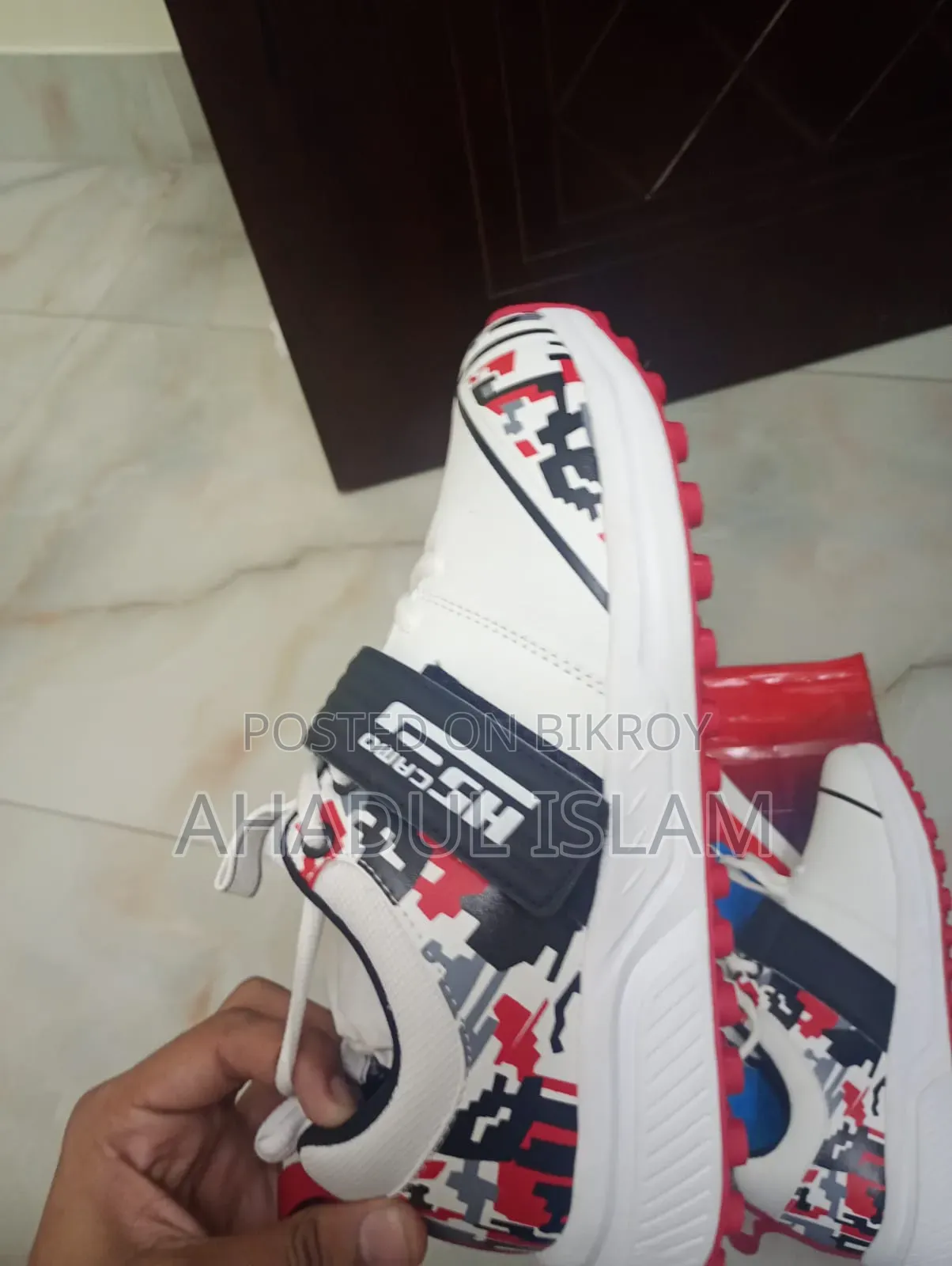 Selling new shoes because the child won't wear them