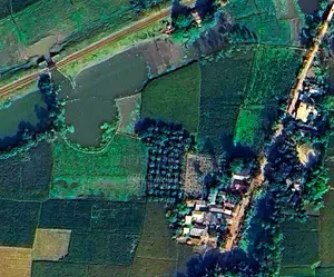 94 decimal charming land for sale with pond and mango orchard next to the railway line