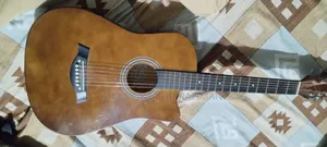 কাবাট গিটার বাদামী রঙ