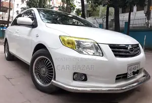 টয়োটা এক্সিও ২০১১ সাদা